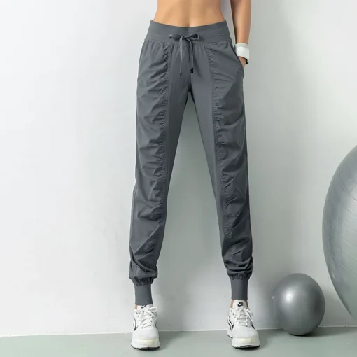 Calça esportiva antirrugas para emagrecer, de caimento solto, corrida, casual, secagem rápida, fina, estilo Harlan