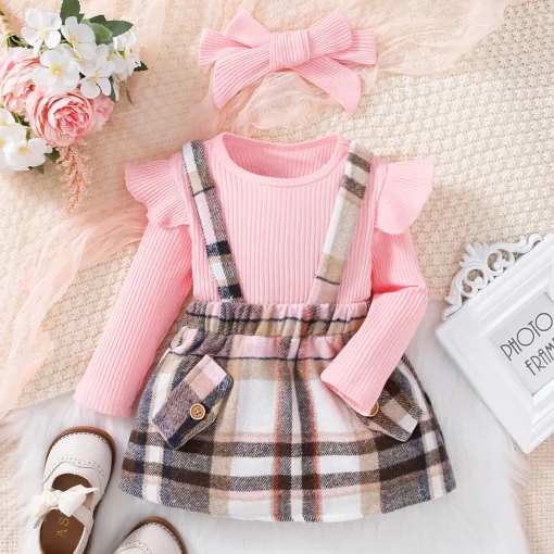 Conjunto de vestido e blusa infantil