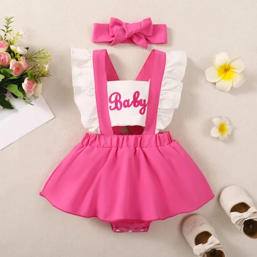 Vestido rosa infantil com acessórios de cabelo